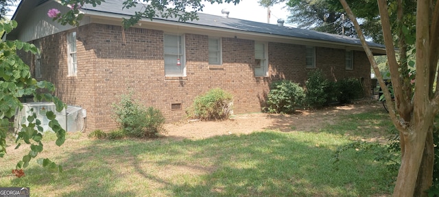 view of property exterior featuring a yard