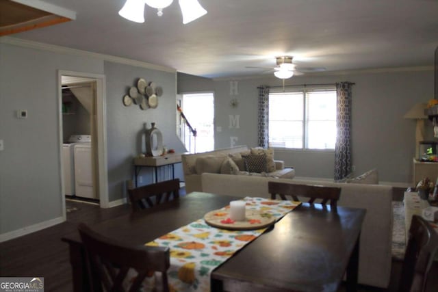 dining area with ornamental molding, washing machine and dryer, ceiling fan, and dark wood-type flooring