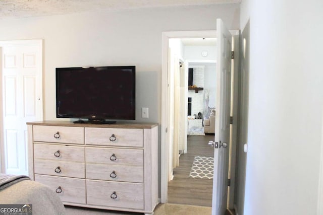 bedroom featuring wood-type flooring