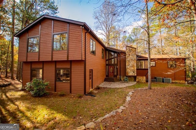 view of home's exterior with cooling unit