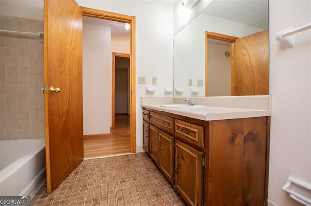 bathroom featuring hardwood / wood-style floors and vanity