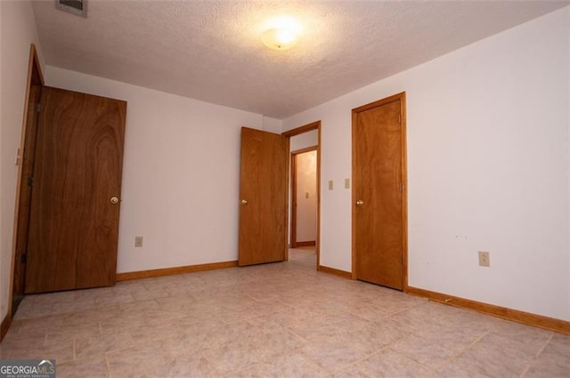 interior space with a textured ceiling