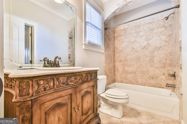 full bathroom featuring tile patterned floors, tiled shower / bath combo, vanity, crown molding, and toilet