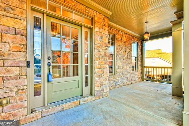 doorway to property featuring a porch