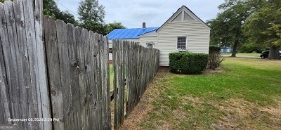 view of home's exterior featuring a lawn