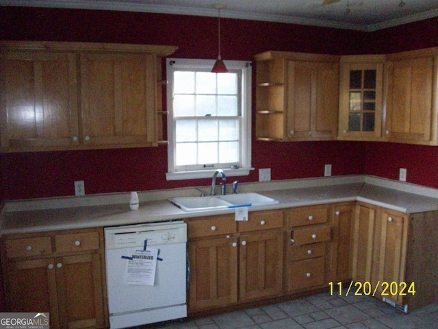 kitchen featuring crown molding, dishwasher, decorative light fixtures, and sink