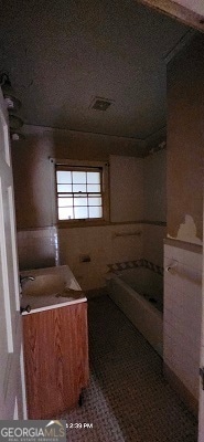 bathroom with a shower