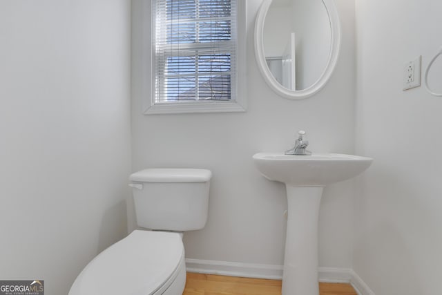 bathroom with sink and toilet