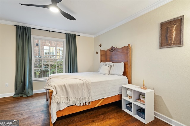 bedroom featuring ceiling fan, ornamental molding, and dark wood-type flooring