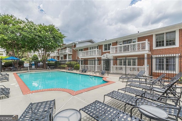 view of swimming pool featuring a patio