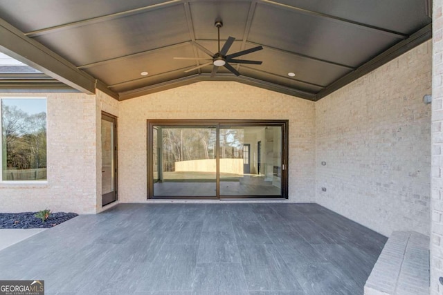 view of patio featuring ceiling fan