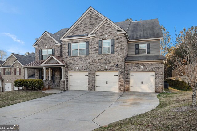 craftsman-style home with a garage