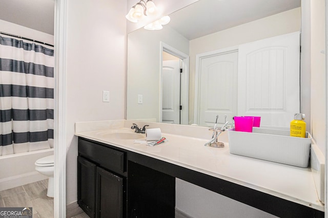 full bathroom featuring vanity, toilet, and shower / bath combo