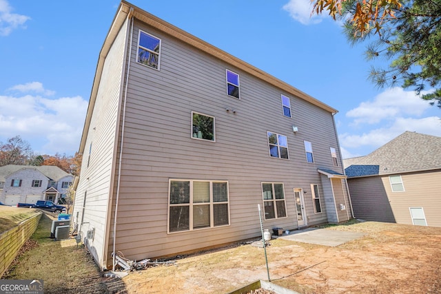 back of house featuring a patio area