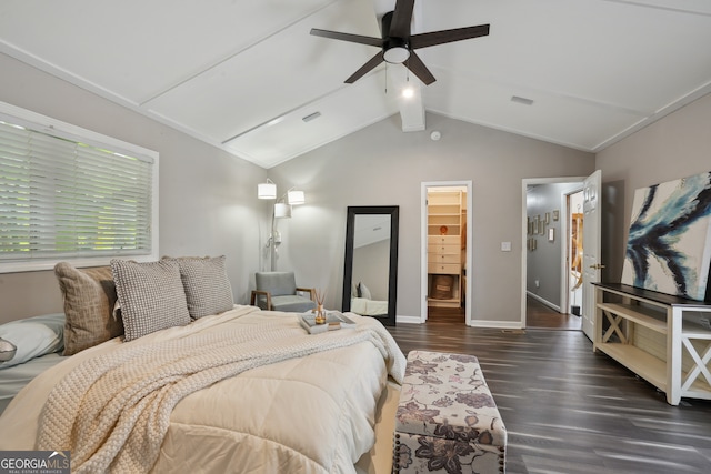 bedroom with a walk in closet, ceiling fan, lofted ceiling with beams, dark hardwood / wood-style floors, and a closet