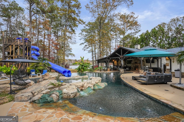 view of pool featuring a patio