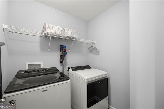 laundry area with washer and dryer