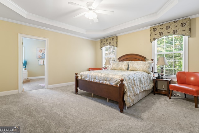 2202 Escalade Ct, Conyers, GA 30094 - bedroom with a tray ceiling, crown molding, multiple windows, carpet, and ceiling fan