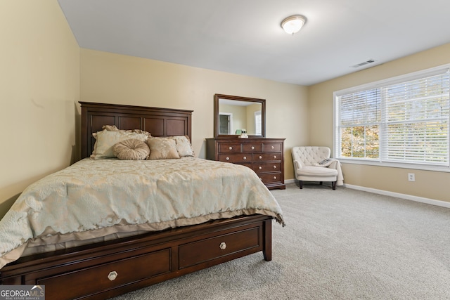 2202 Escalade Ct, Conyers, GA 30094 - bedroom with baseboards and light colored carpet