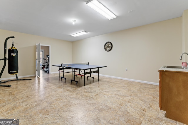 2202 Escalade Ct, Conyers, GA 30094 - recreation room featuring a sink and baseboards