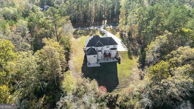 2202 Escalade Ct, Conyers, GA 30094 - view from above of property with a forest