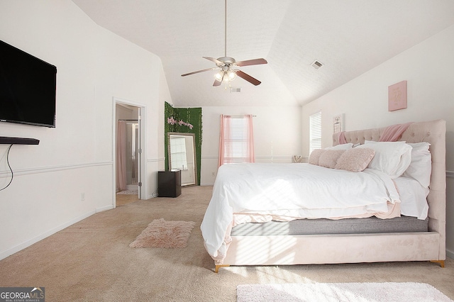 bedroom with lofted ceiling, ceiling fan, visible vents, and light colored carpet