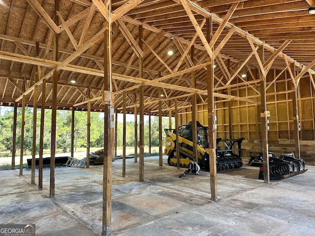 misc room with vaulted ceiling and a healthy amount of sunlight