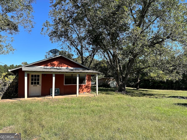 exterior space featuring a front lawn