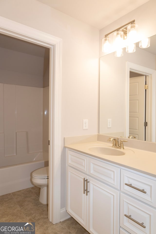 full bathroom with toilet, shower / tub combination, vanity, and tile patterned floors