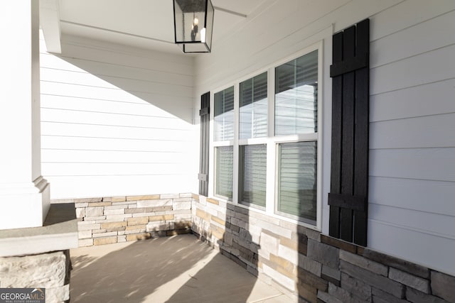 view of patio featuring covered porch