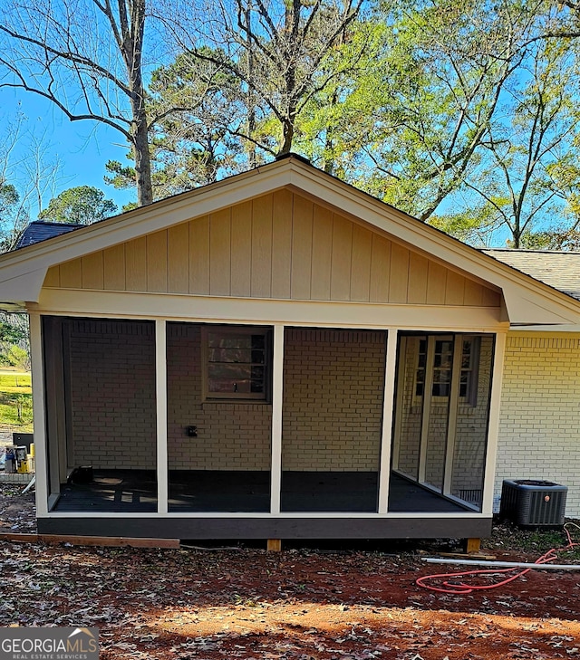 view of property exterior with central AC