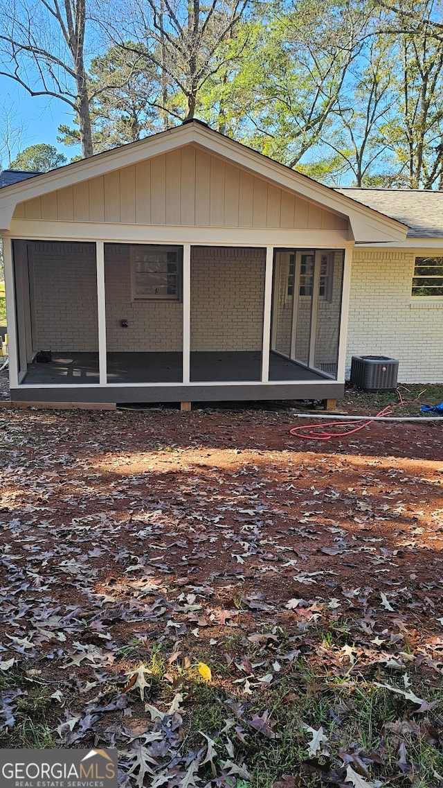 view of exterior entry featuring cooling unit