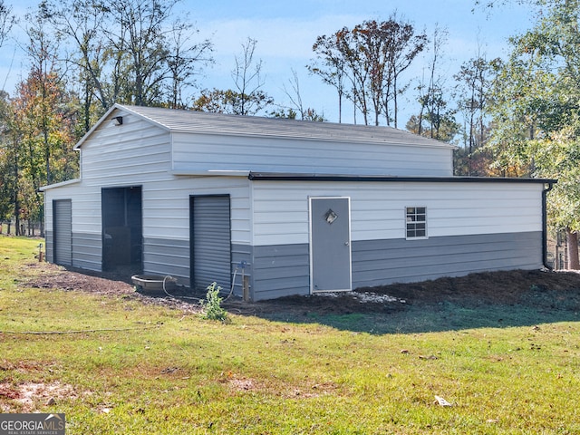 garage with a lawn