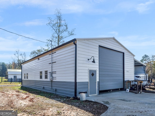 view of outbuilding with a garage