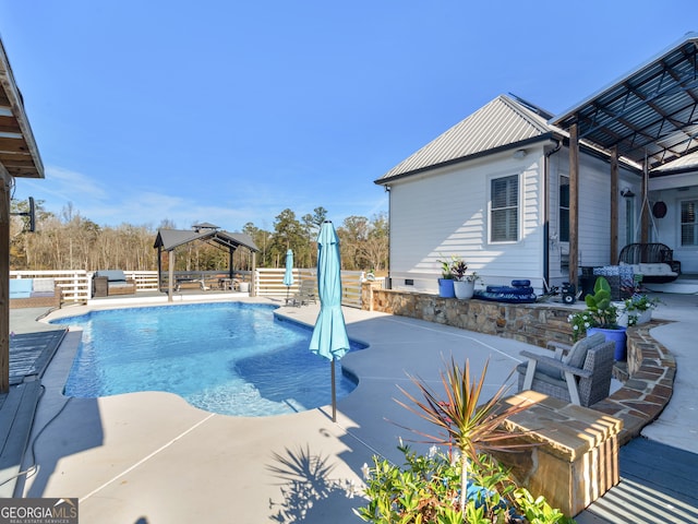 view of pool with a gazebo and a patio