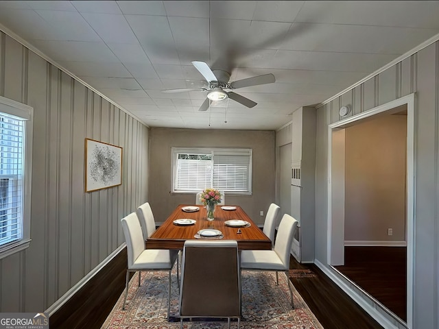 unfurnished living room with dark hardwood / wood-style floors and a brick fireplace