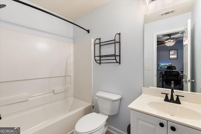 full bathroom with vanity, bathing tub / shower combination, and toilet