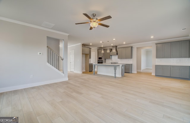 carpeted spare room with crown molding and a tray ceiling