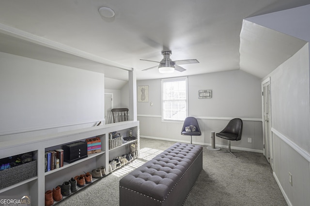 sitting room featuring lofted ceiling, carpet flooring, and ceiling fan