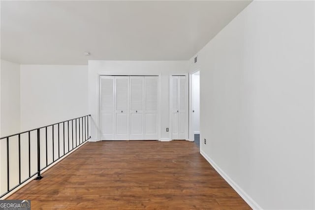 interior space with hardwood / wood-style floors