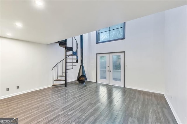 interior space featuring dark hardwood / wood-style flooring and french doors