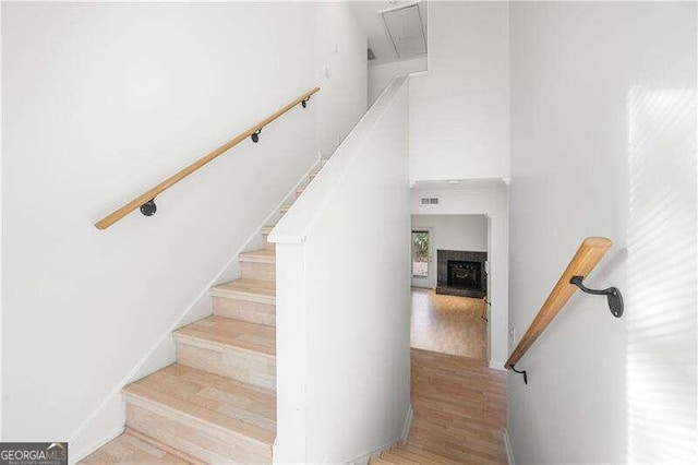 staircase featuring hardwood / wood-style flooring