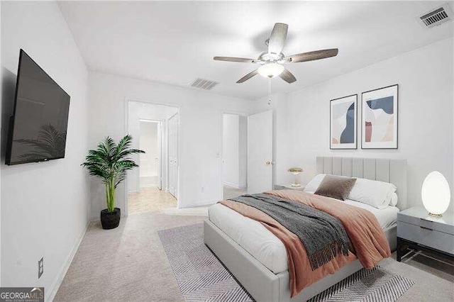 carpeted bedroom featuring ceiling fan