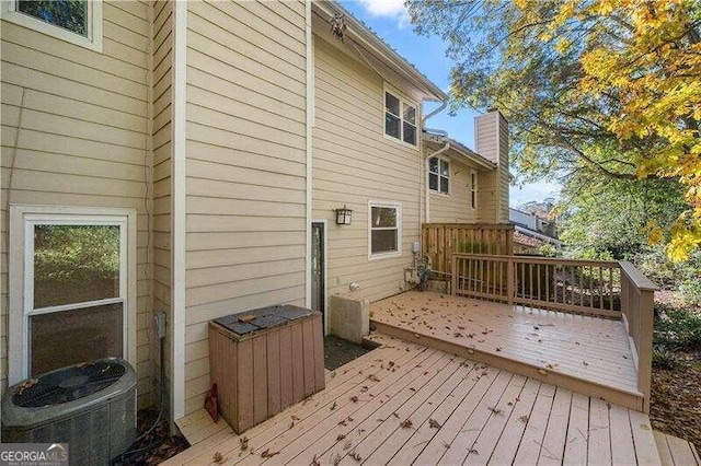 wooden terrace with central AC unit