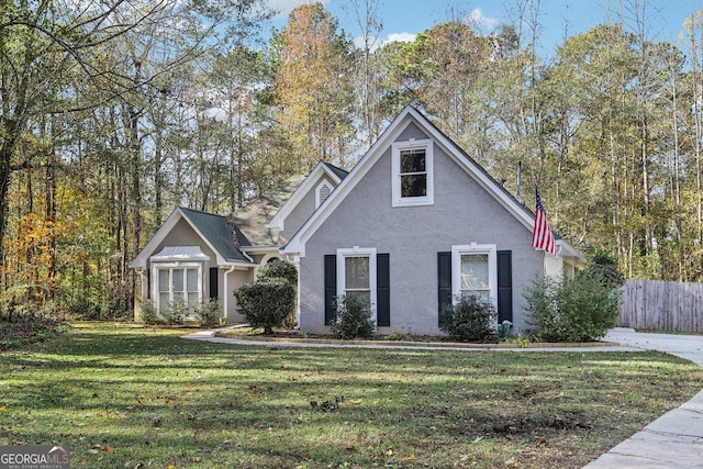 view of front of home with a front lawn