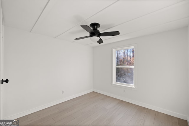 spare room with ceiling fan and light hardwood / wood-style floors