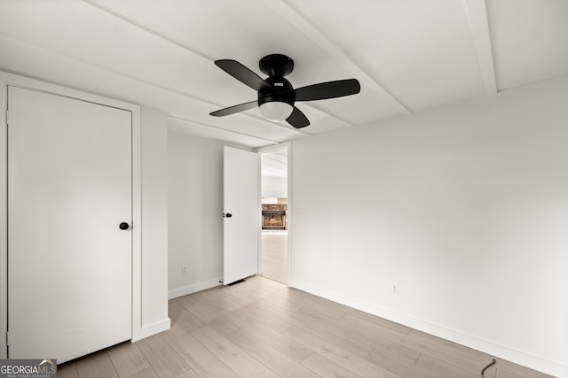 spare room with ceiling fan and light hardwood / wood-style floors