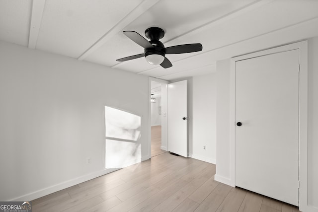 unfurnished room with light hardwood / wood-style flooring and ceiling fan