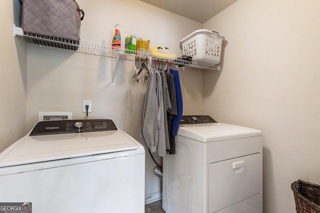 laundry room featuring washing machine and dryer