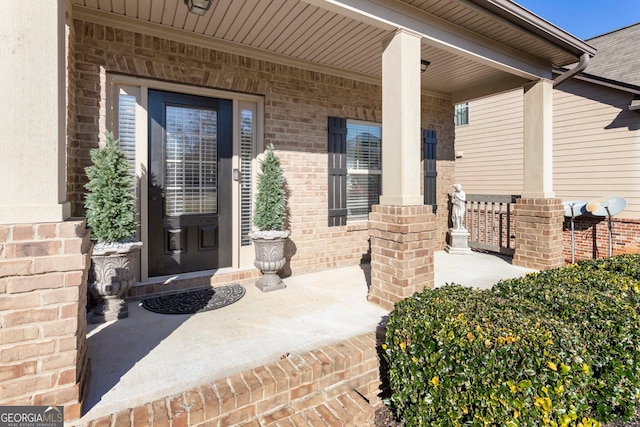 entrance to property with a porch